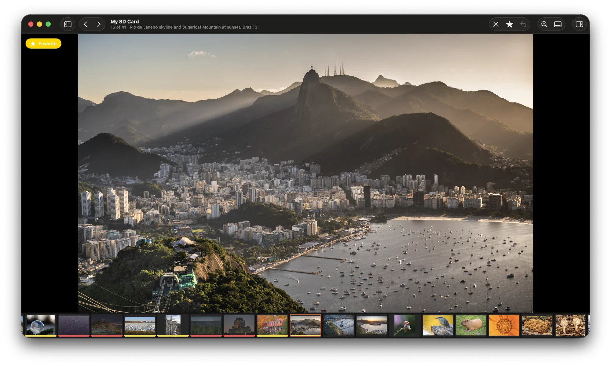 Culla showing a sunset photo of Rio de Janeiro marked as a favorite, with a filmstrip of the shoot below
